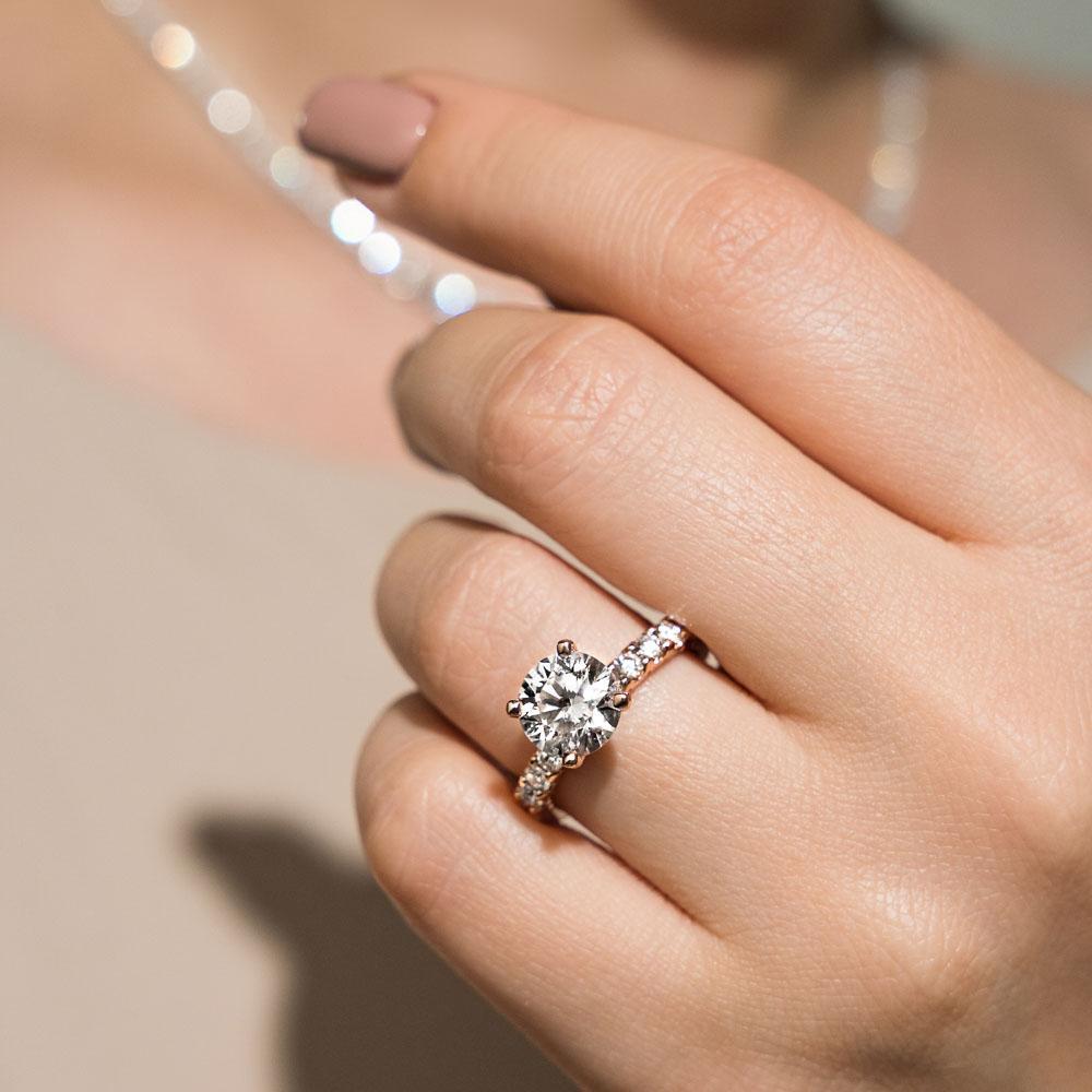 https://www.miadonna.com/cdn/shop/products/10-Stone-Lab-Grown-Diamond-Engagement-Ring-lifestyle-005_1200x.jpg?v=1632329830